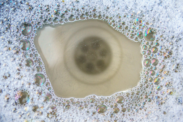 Clogged kitchen sink requiring drain cleaning